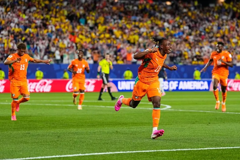 Ivory Coast's Yan Diomande (11) celebrates after teammate Amad Diallo (15) scored their first goal during the World Cup Group E soccer match between Ivory Coast and Ecuador in Philadelphia, Sunday, June 14, 2026. (AP Photo/Petr David Josek)