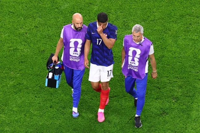 ARLINGTON, TEXAS - JULY 14: William Saliba of France leaves the game with an injury during the FIFA World Cup 2026 Semi Final match between France and Spain at Dallas Stadium on July 14, 2026 in Arlington, Texas. (Photo by Robbie Jay Barratt - AMA/Getty Images)