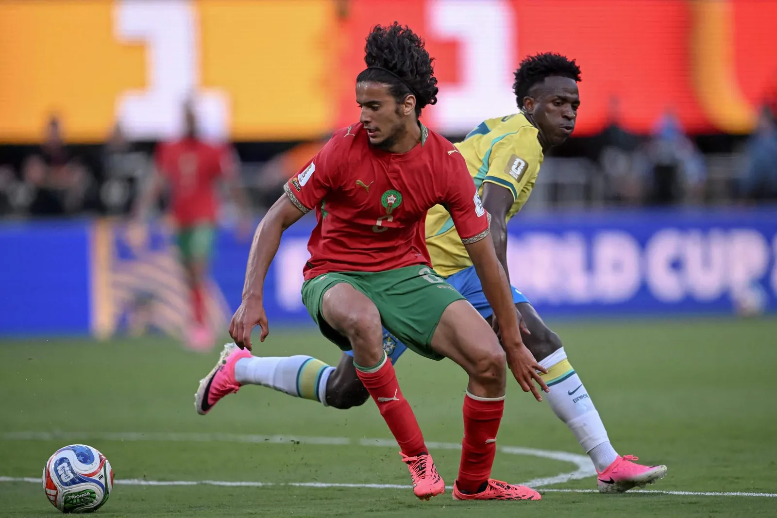 Bouaddi playing for Morocco against Brazil