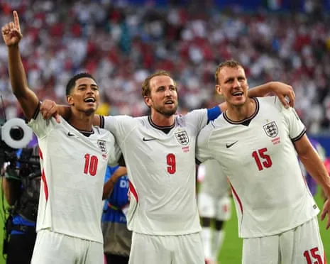 Jude Bellingham, Harry Kane and Dan Burn celebrate England’s quarter-final victory
