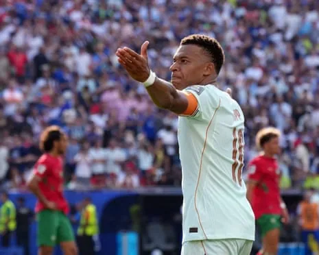 Kylian Mbappé celebrates scoring France's opener