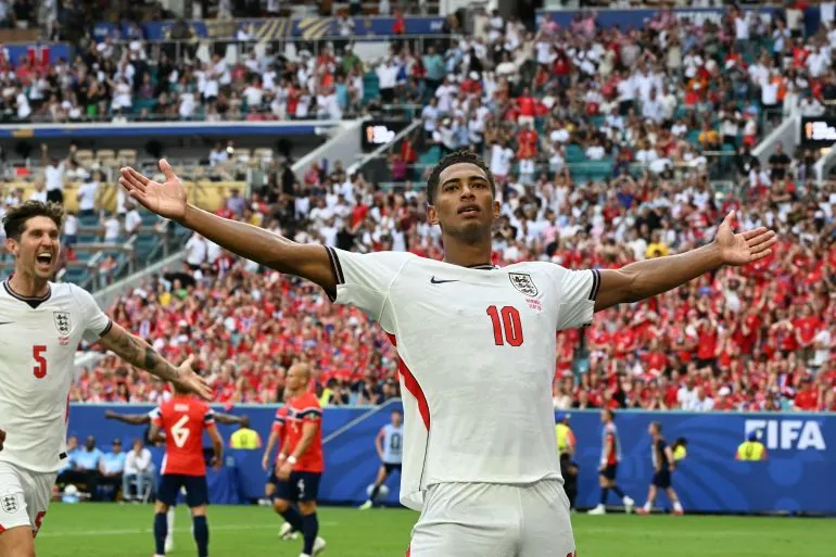 England's midfielder #10 Jude Bellingham celebrates scoring his team's second goal during the 2026 World Cup football tournament quarter-final match between Norway and England at Miami Stadium in Miami on July 11, 2026.